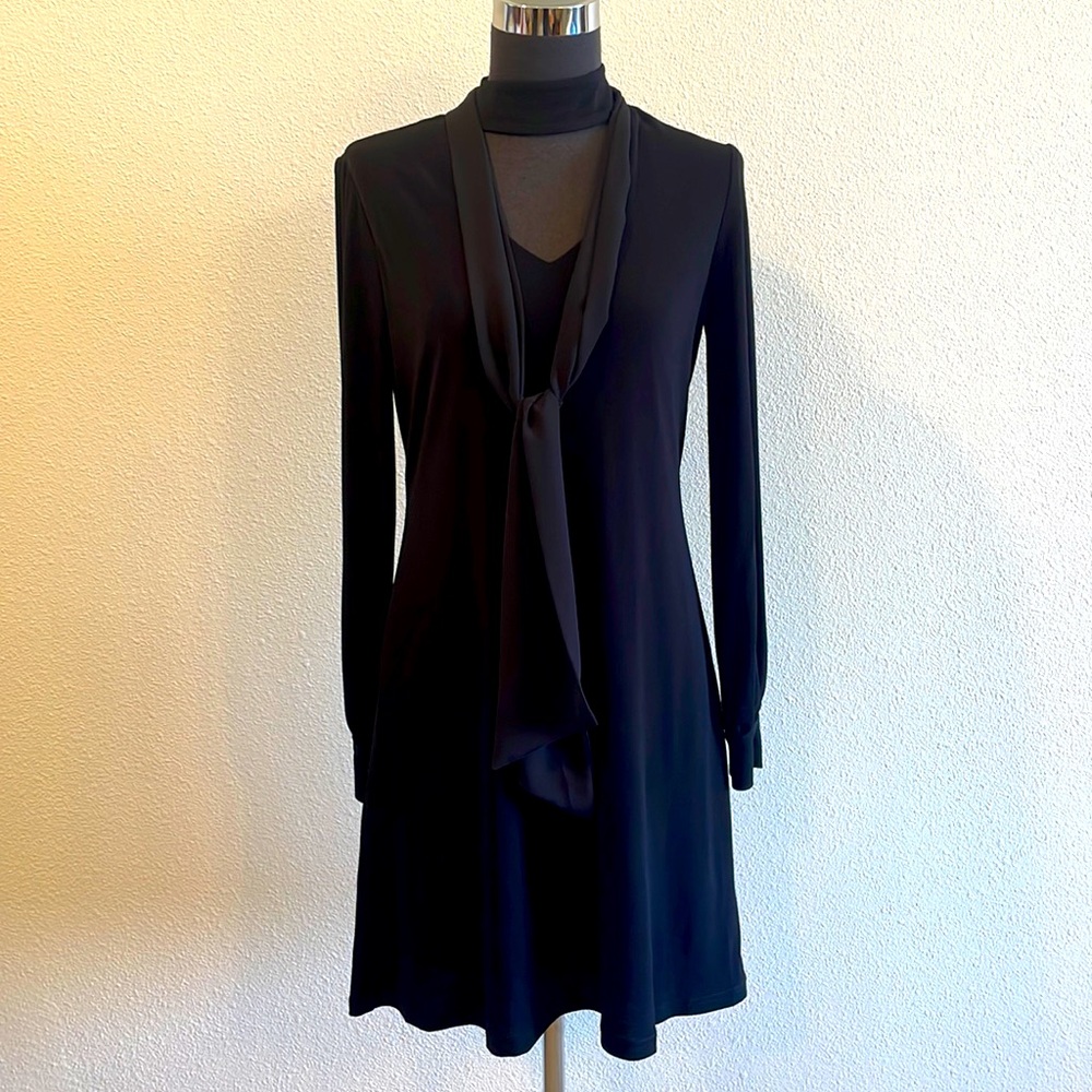 Long sleeve black dress.